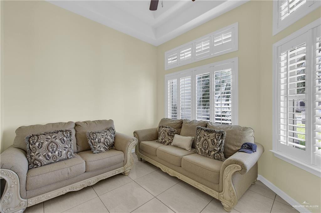 305 North 15th Street Hidalgo, TX 78557 - Photo 14 of 28 a living room with furniture and a large window