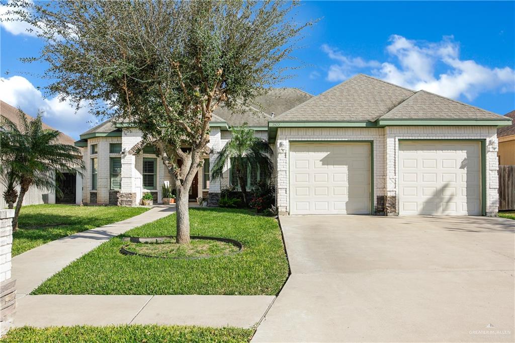 305 North 15th Street Hidalgo, TX 78557 - Photo 25 of 28 front view of a house with a yard