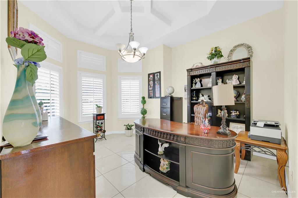 305 North 15th Street Hidalgo, TX 78557 - Photo 9 of 28 a room with stainless steel appliances kitchen island granite countertop a large kitchen island a stove and a sink