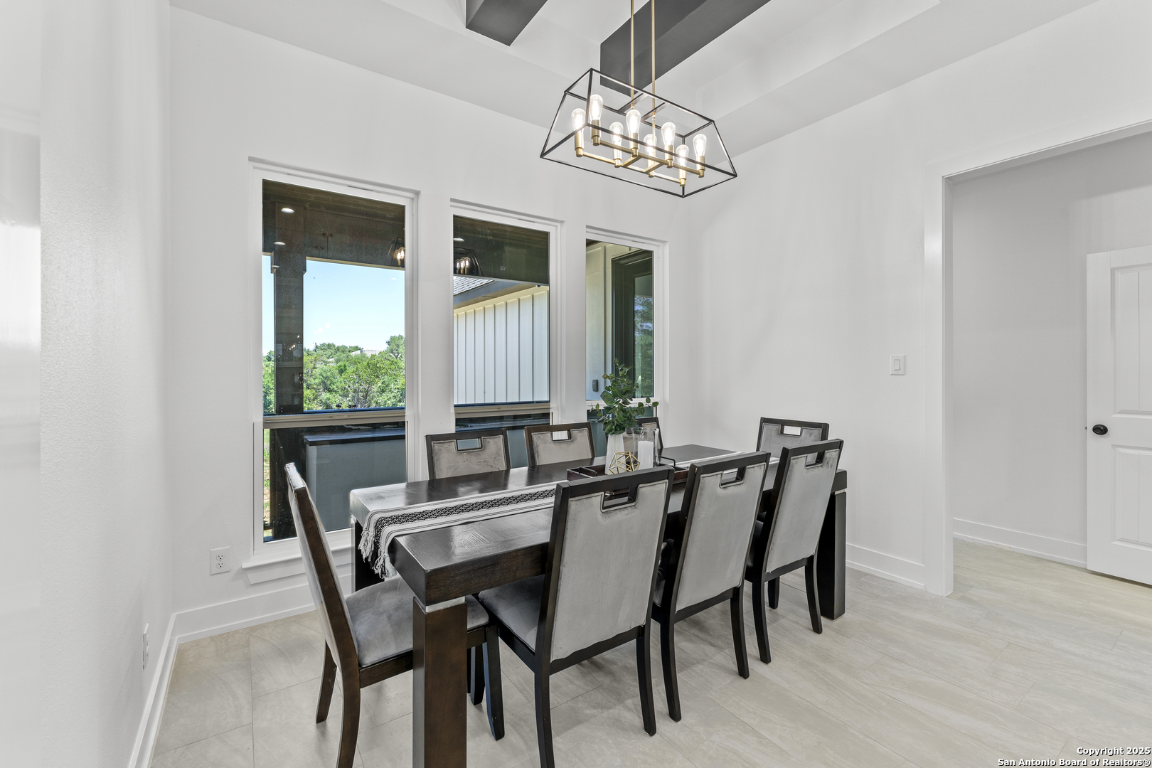 1101 Persimmon Pass Fischer, TX 78623 - Photo 11 of 43 a view of a dining room with furniture and window