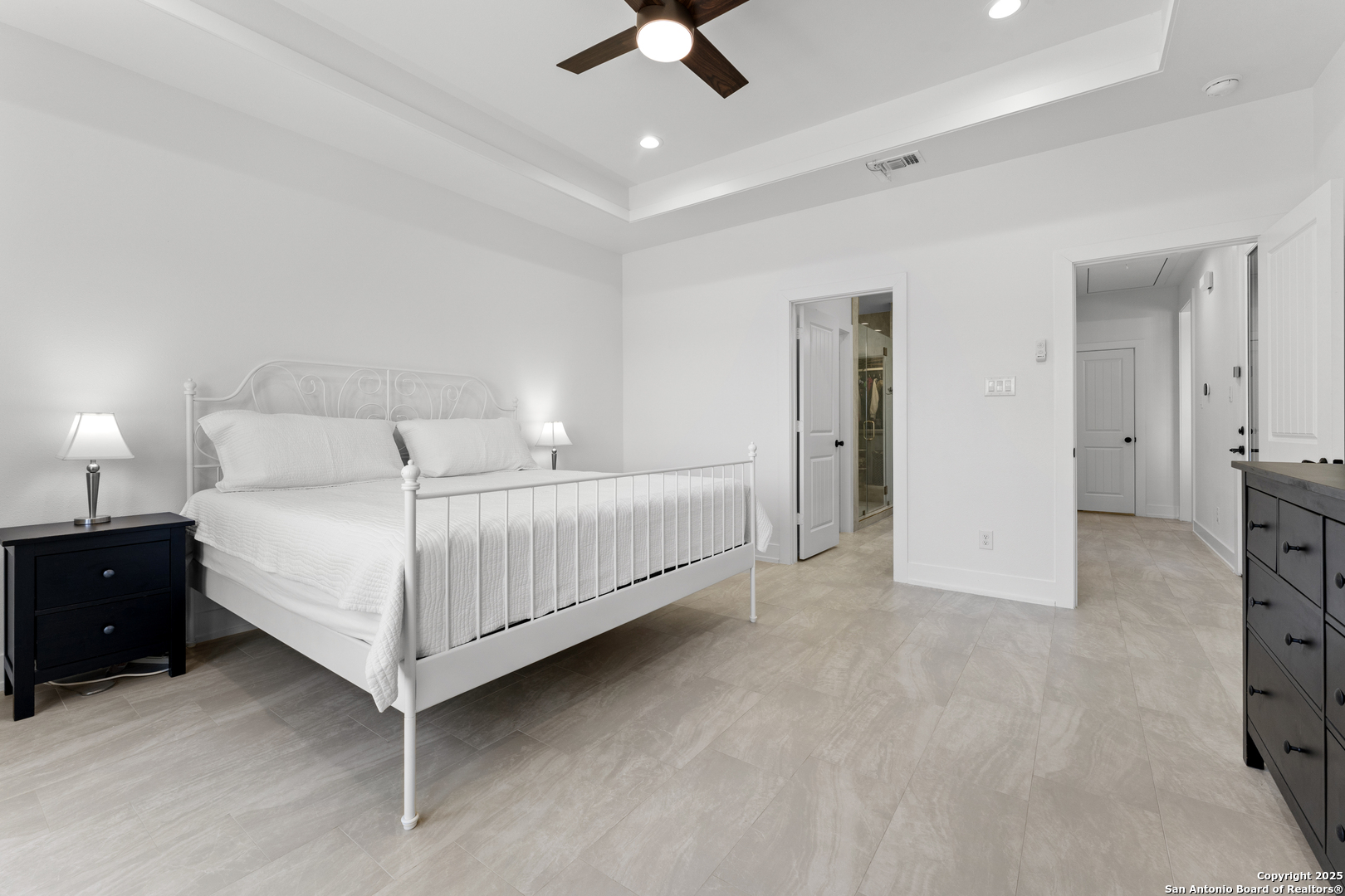1101 Persimmon Pass Fischer, TX 78623 - Photo 23 of 43 a bedroom with a bed and a ceiling fan