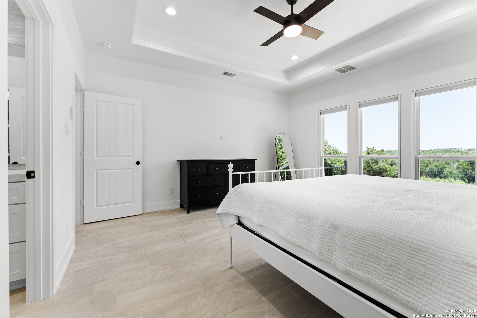 1101 Persimmon Pass Fischer, TX 78623 - Photo 25 of 43 a bedroom with a bed and window