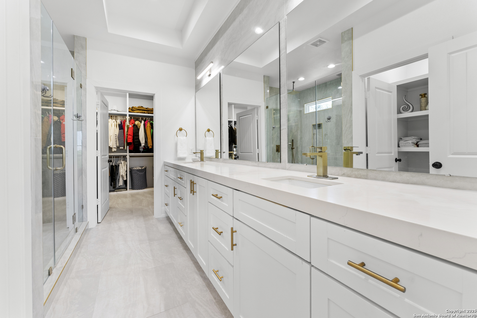 1101 Persimmon Pass Fischer, TX 78623 - Photo 26 of 43 a bathroom with a double vanity sink and a mirror