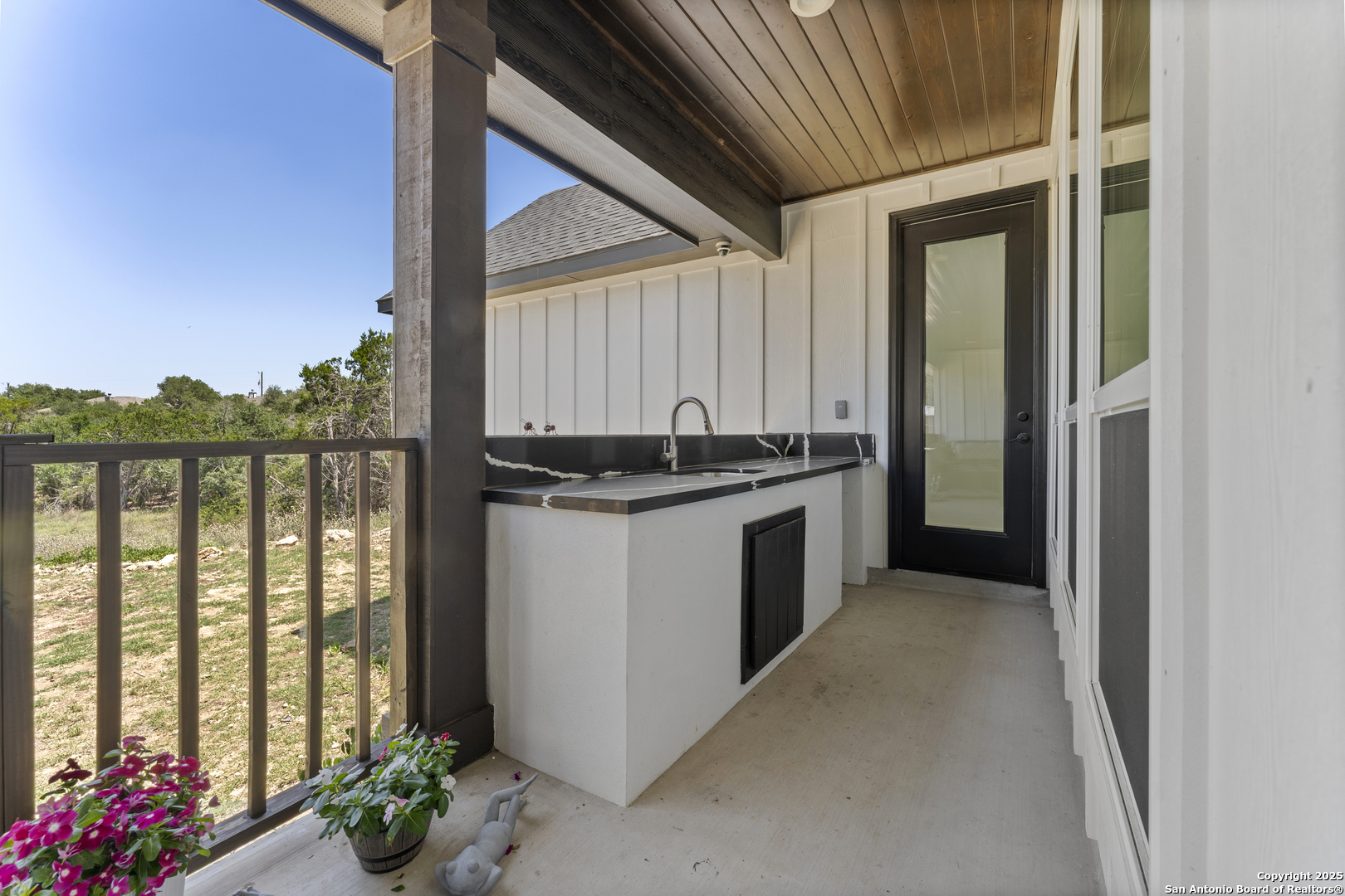 1101 Persimmon Pass Fischer, TX 78623 - Photo 40 of 43 a kitchen with a sink and cabinets