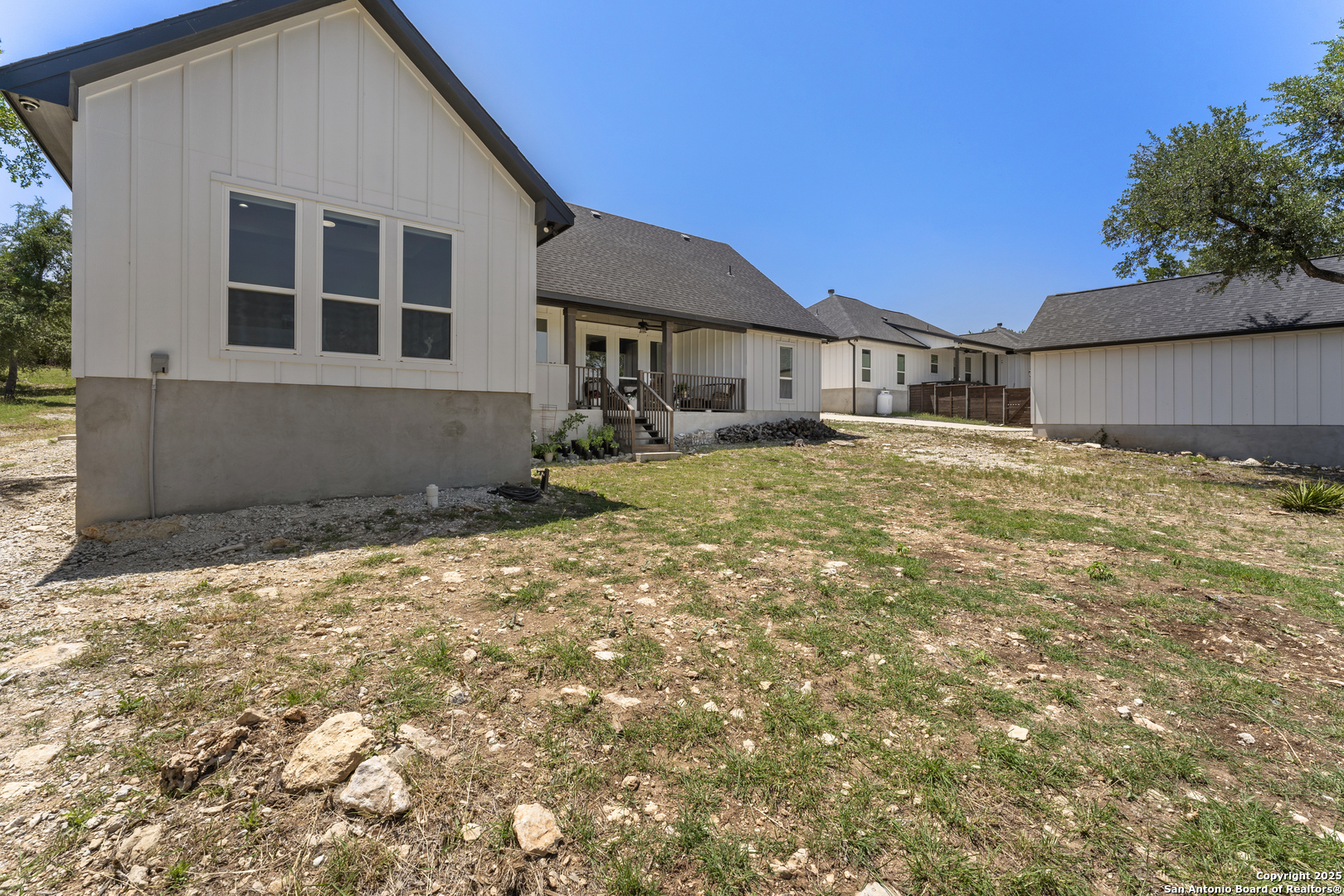 1101 Persimmon Pass Fischer, TX 78623 - Photo 43 of 43 a house with yard in front of it