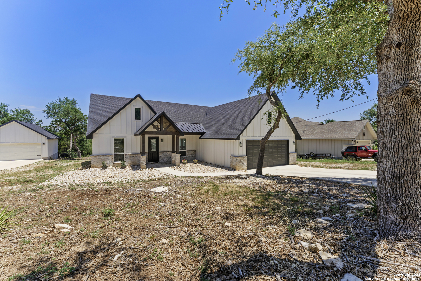 1101 Persimmon Pass Fischer, TX 78623 - Photo 5 of 43 a view of a house with a yard