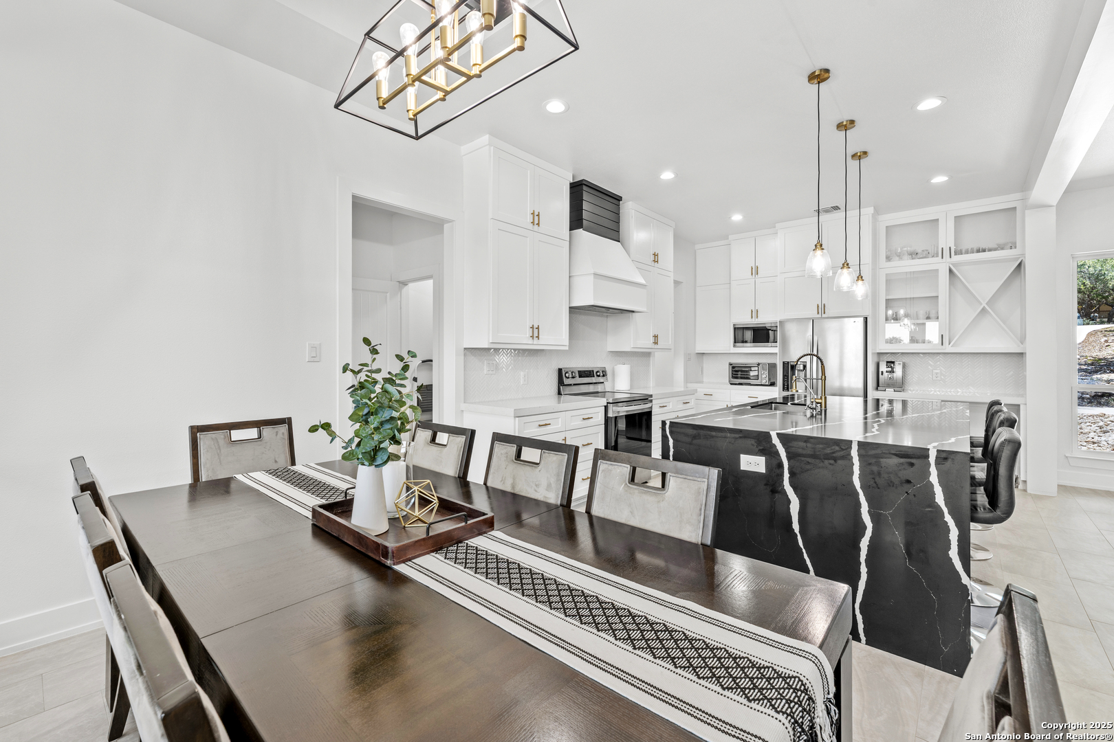1101 Persimmon Pass Fischer, TX 78623 - Photo 8 of 43 a living room with lots of furniture and kitchen view