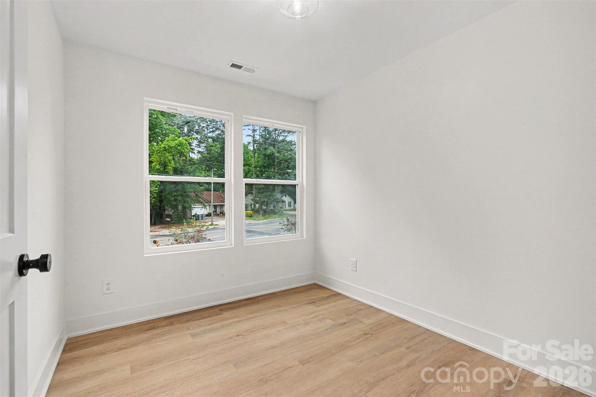 7521 Lawyers Road Charlotte, NC 28227 - Photo 23 of 35 an empty room with a window