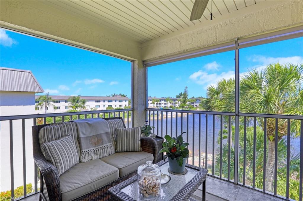 1004 Manatee Road, Unit H301 Naples, FL 34114 - Photo 6 of 33 a balcony with furniture