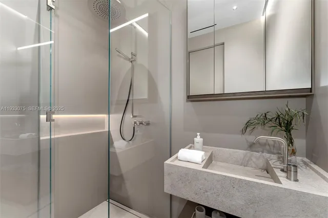 a front view of a house with plants