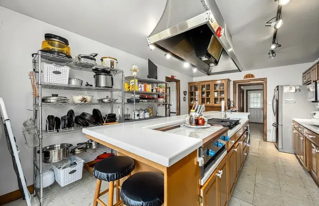 a spacious bathroom with a double vanity sink and a mirror