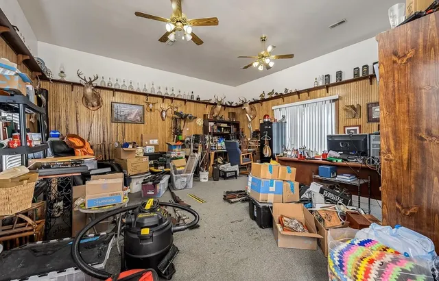 a kitchen with stainless steel appliances granite countertop a sink stove and a refrigerator