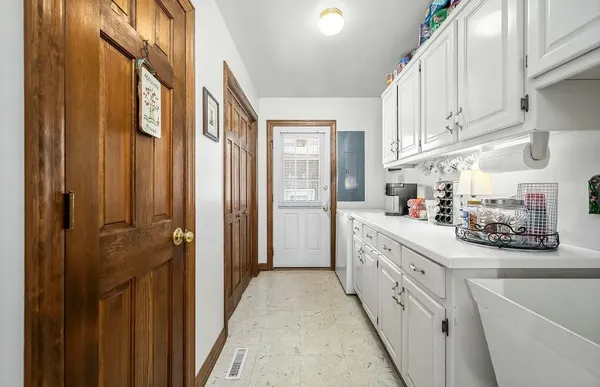 a kitchen with stainless steel appliances a sink stove and refrigerator