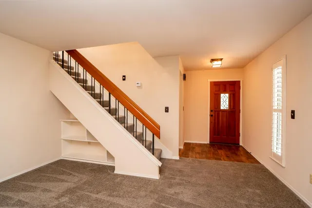 a view of an entryway with staircase
