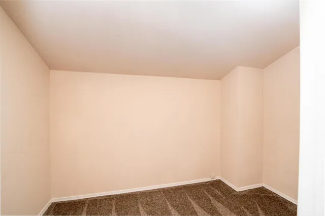 a view of wooden floor in a bathroom