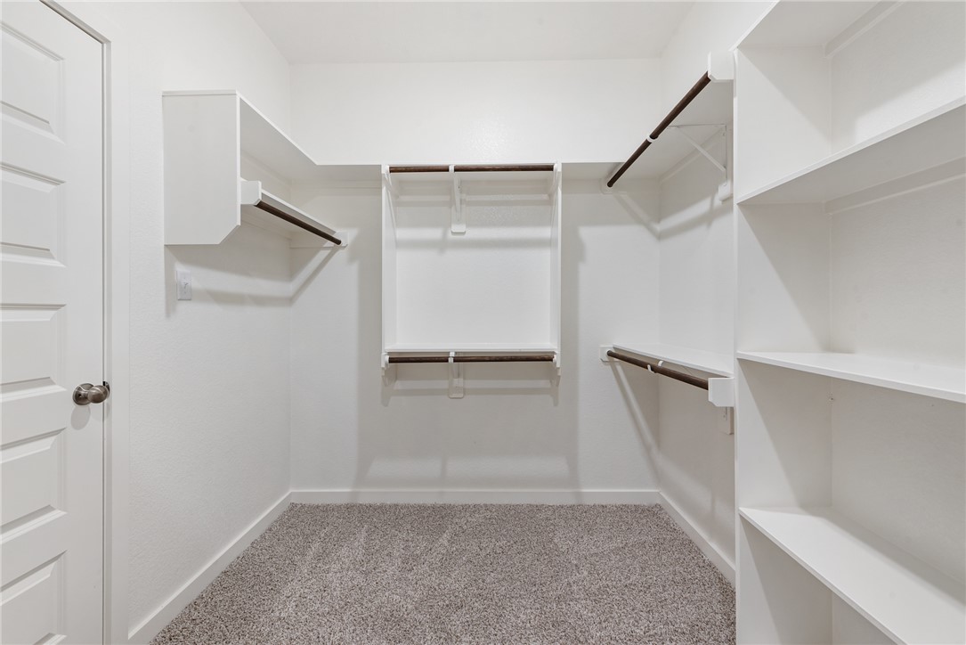 2415 Rooke Road Bryan, TX 77807 - Photo 33 of 36 a view of an empty walk in closet