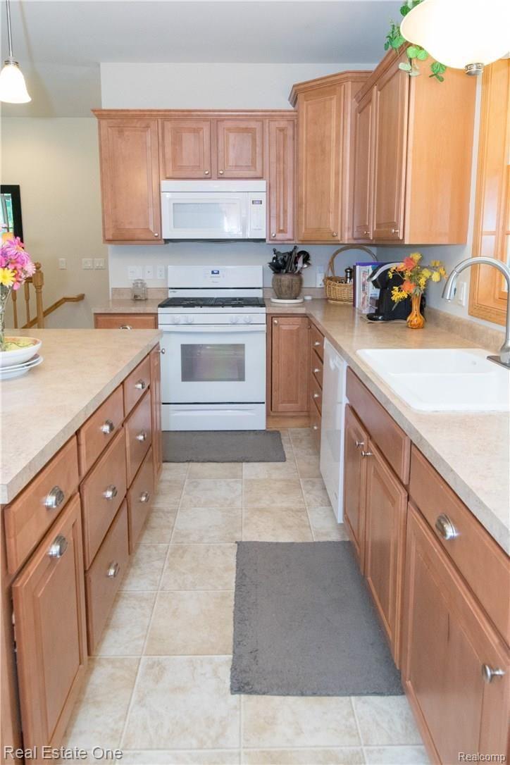 871 Heights Road Lake Orion, MI 48362 - Photo 18 of 38 Cabinets and storage galore!