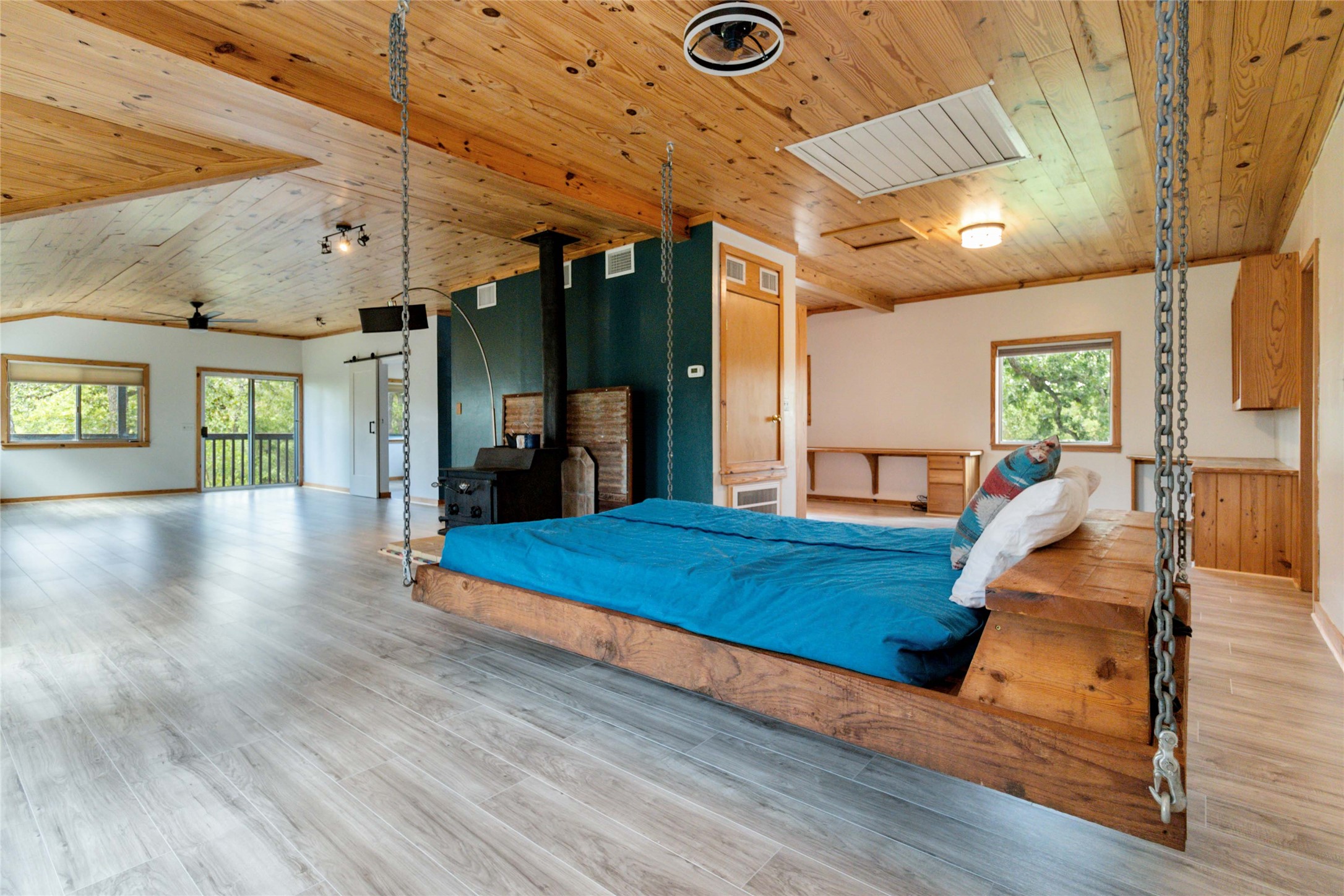 180 Ironstone Road Smithville, TX 78957 - Photo 17 of 37 a large room with lots of furniture and a chandelier