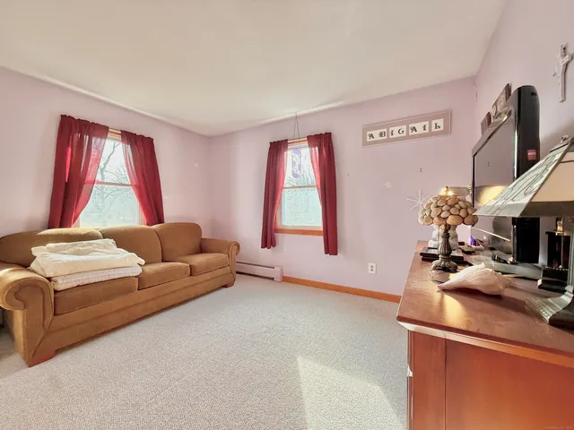 a view of a livingroom with furniture