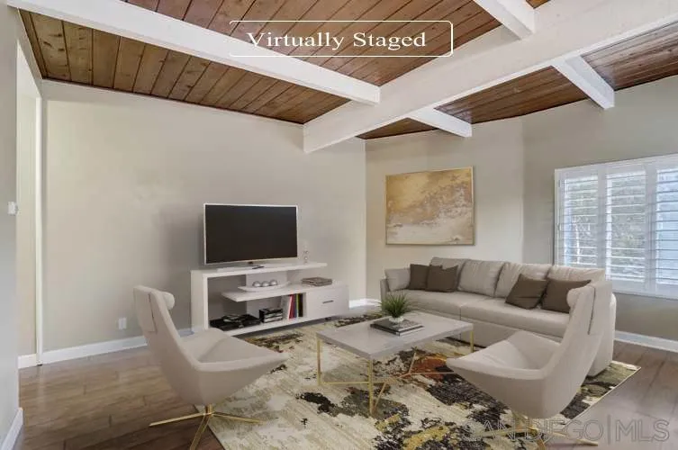 6395 Rancho Mission Road, Unit 15 San Diego, CA 92108 - Photo 2 of 21 a living room with furniture a couch and a flat screen tv