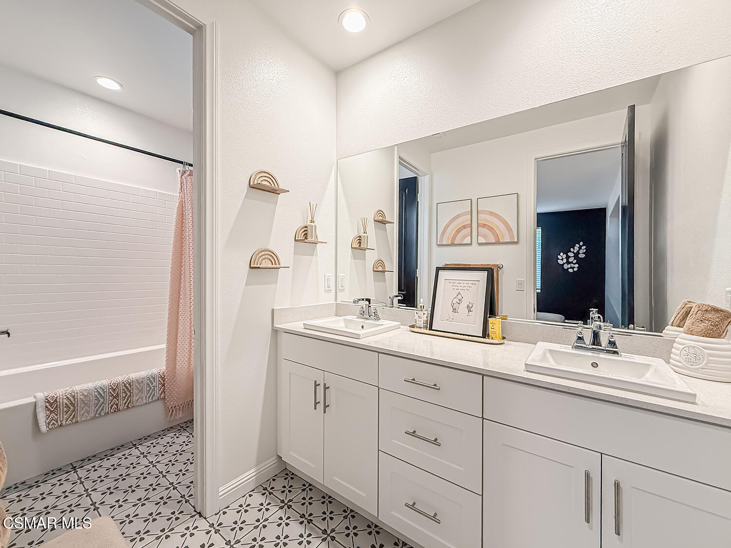 335 Fraser Point Camarillo, CA 93012 - Photo 46 of 85 a bathroom with a double vanity sink mirror and shower