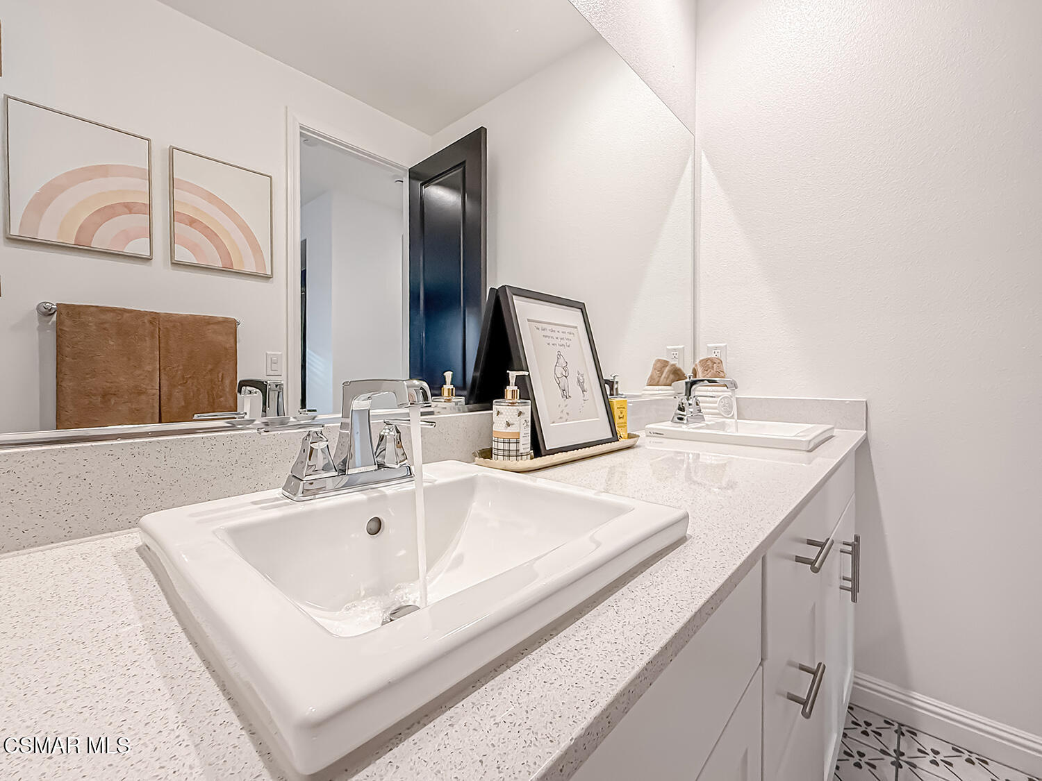 335 Fraser Point Camarillo, CA 93012 - Photo 47 of 85 a bathroom with a sink and a mirror
