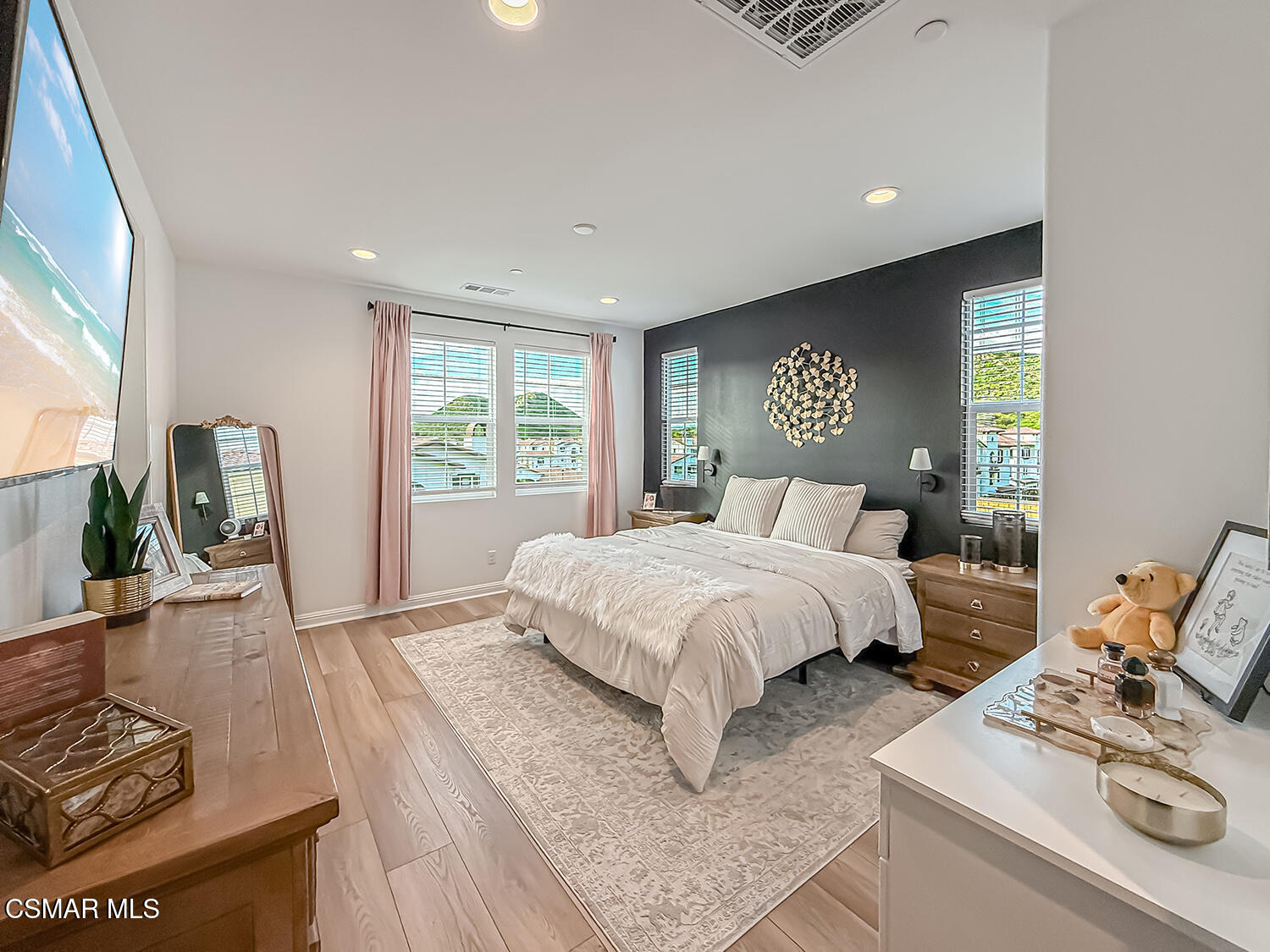 335 Fraser Point Camarillo, CA 93012 - Photo 53 of 85 a bedroom with a bed and wooden floor