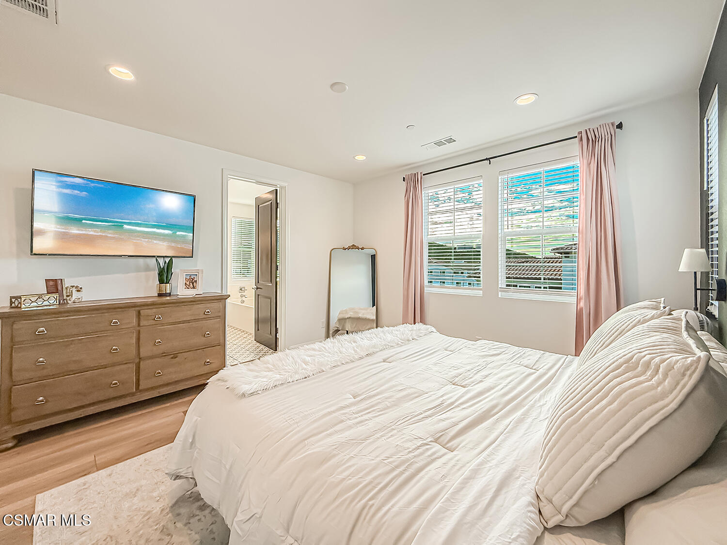 335 Fraser Point Camarillo, CA 93012 - Photo 56 of 85 a bedroom with a bed and a window