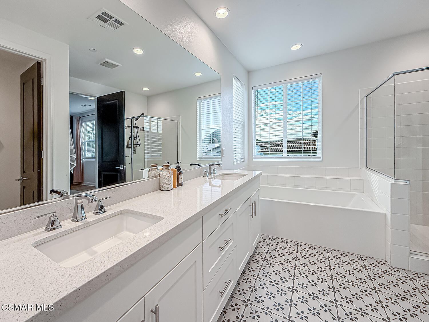 335 Fraser Point Camarillo, CA 93012 - Photo 59 of 85 a bathroom with a tub sink and a mirror