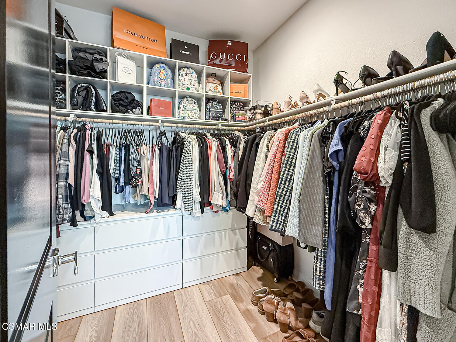 335 Fraser Point Camarillo, CA 93012 - Photo 63 of 85 a view of walk in closet with clothes and shoes