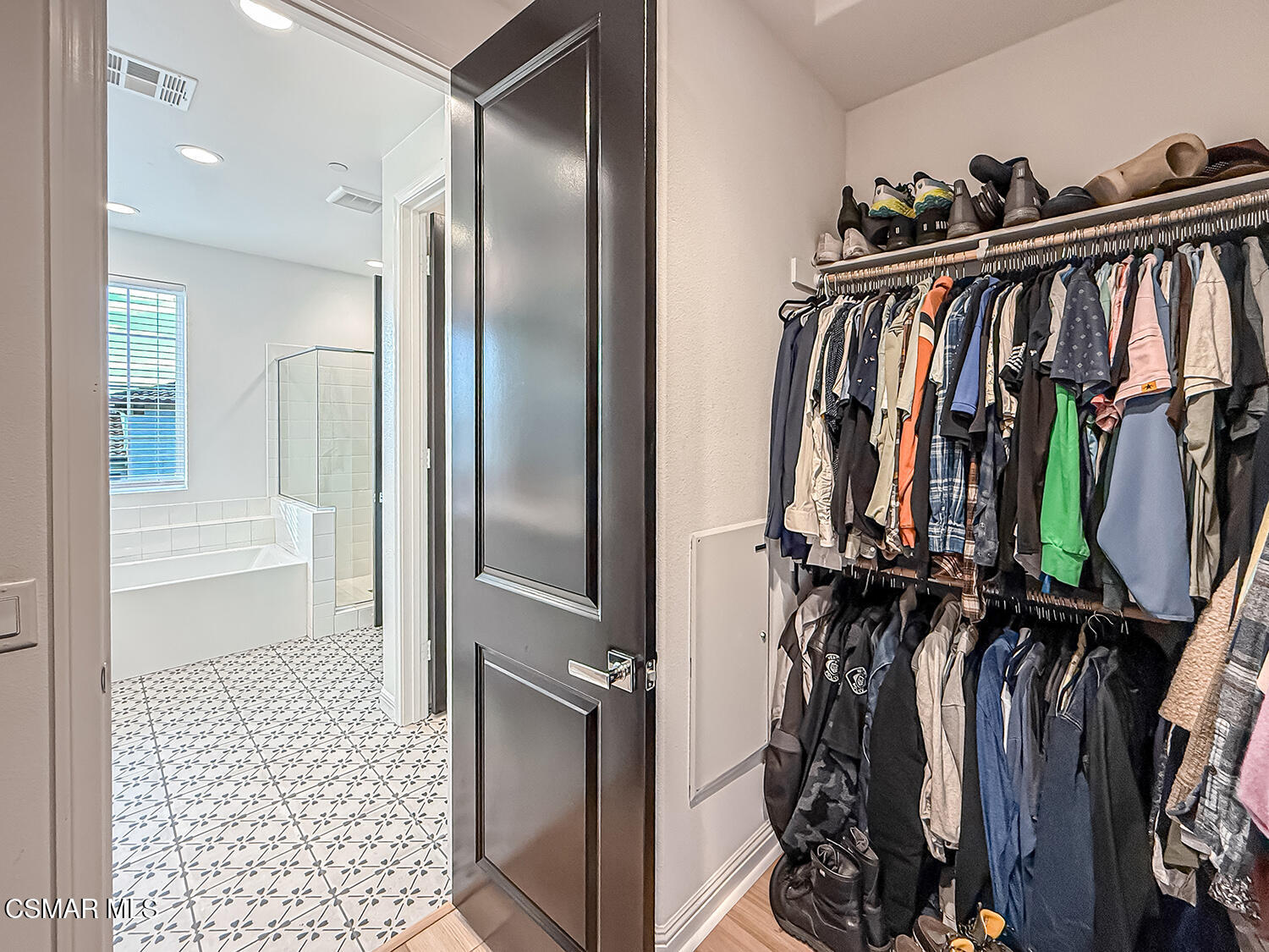 335 Fraser Point Camarillo, CA 93012 - Photo 64 of 85 a view of walk in closet with clothes and shoes