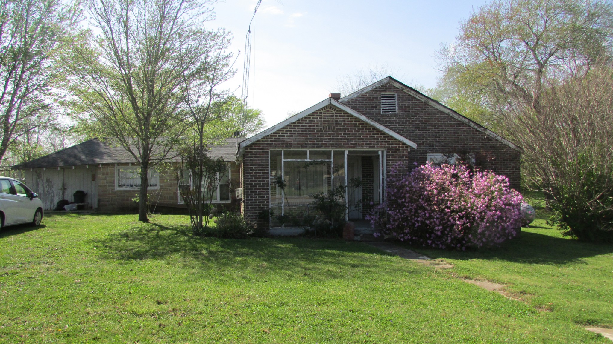 1133 Rabbit Trail Road Five Points, TN 38457 - Photo 2 of 11 a front view of a house with garden