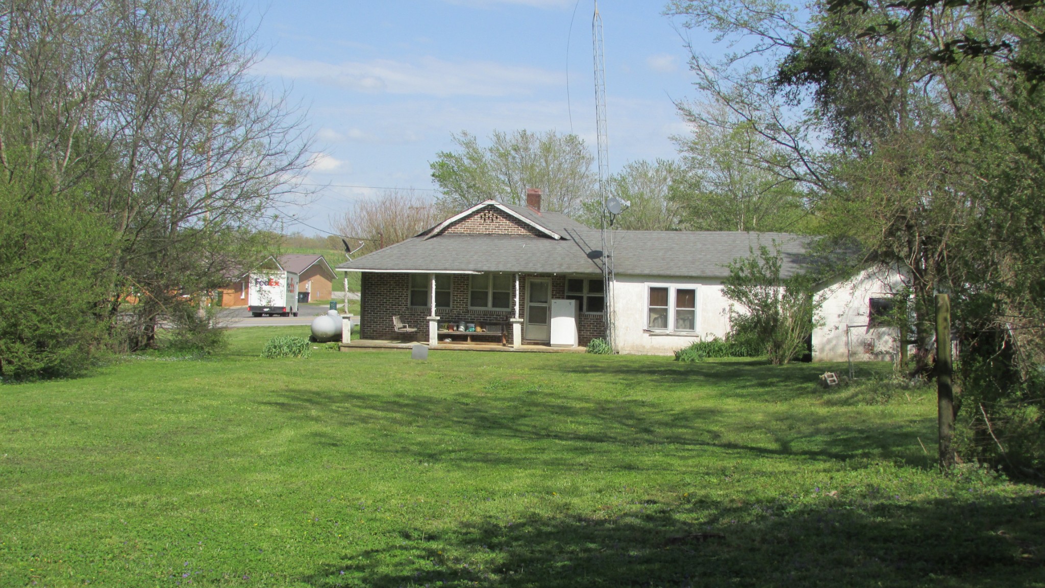 1133 Rabbit Trail Road Five Points, TN 38457 - Photo 8 of 11 a front view of a house with a garden