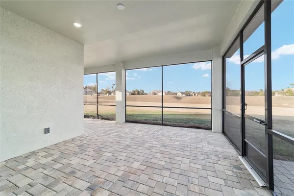 a view of a room with a large window