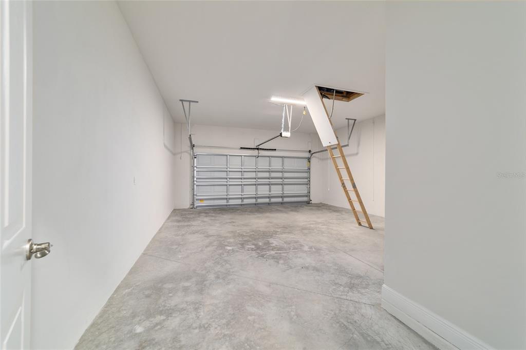 1499 East Pegasus Lane Inverness, FL 34453 - Photo 39 of 46 a view of a room with stairs and white walls