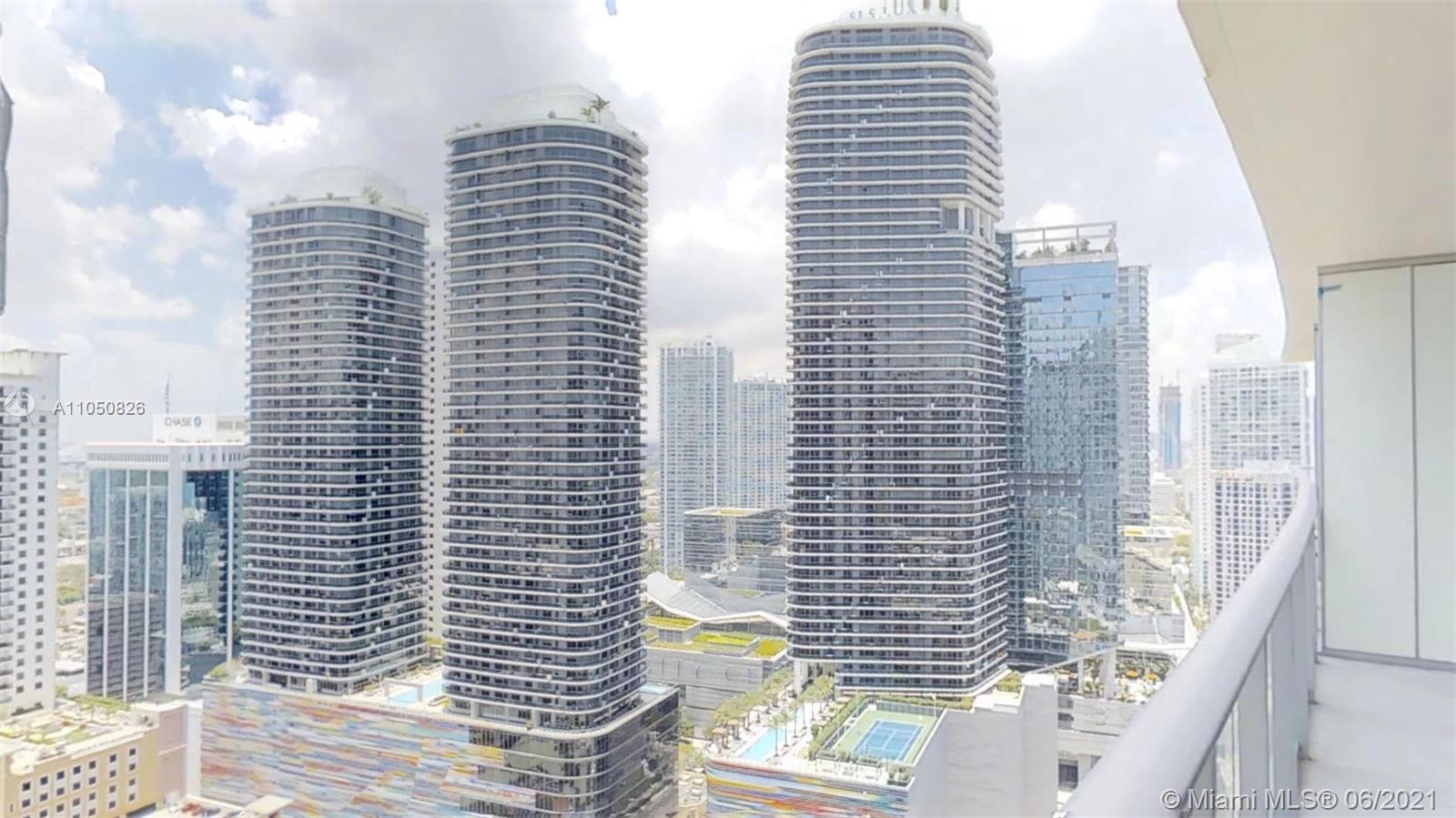 1010 Brickell Avenue, Unit 3209 Miami, FL 33131 - Photo 15 of 31 a view of balcony with a couple of white buildings