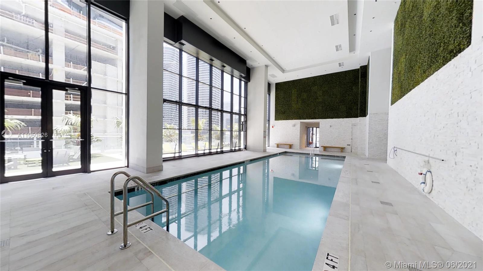 1010 Brickell Avenue, Unit 3209 Miami, FL 33131 - Photo 25 of 31 a view of an entryway with wooden floor