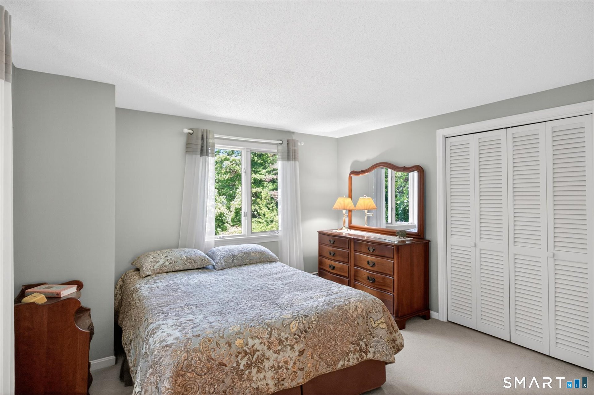 5 Shingle Mill Drive Canton, CT 06019 - Photo 29 of 38 a bedroom with a bed and a dresser