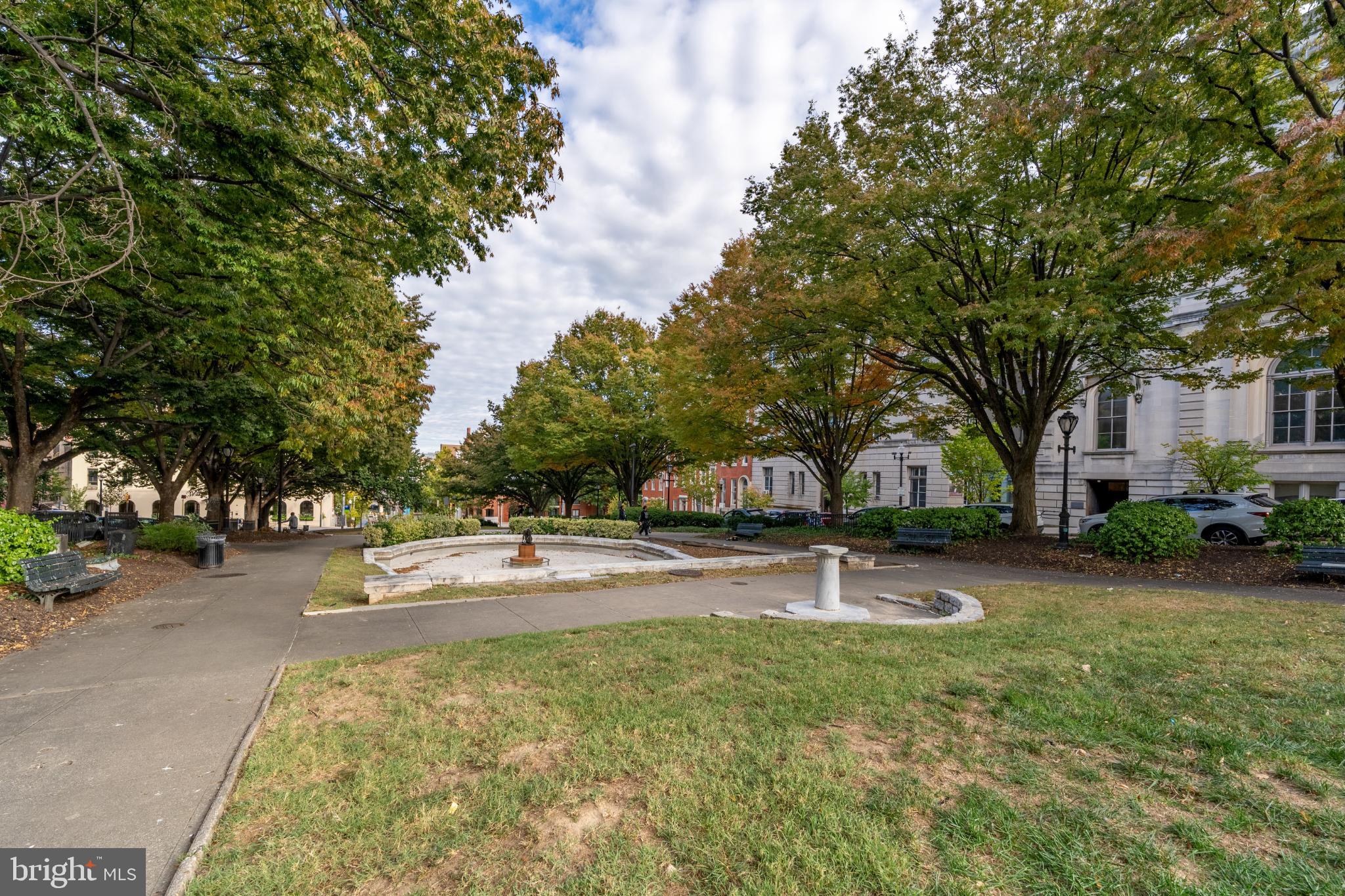 14 East Mt Vernon Place, Unit 15 Baltimore, MD 21202 - Photo 29 of 29 a swimming pool with outdoor seating and yard