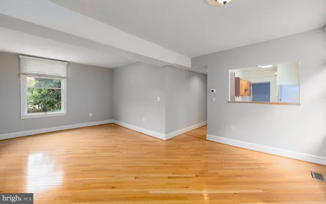 an empty room with window