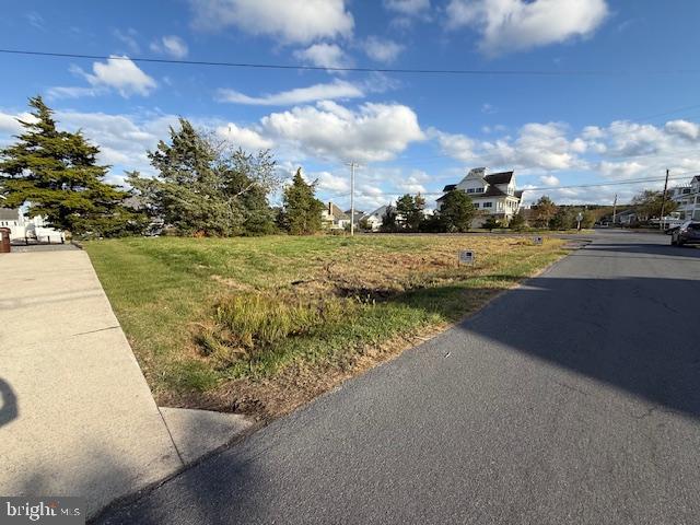 a view of a lake with a big yard