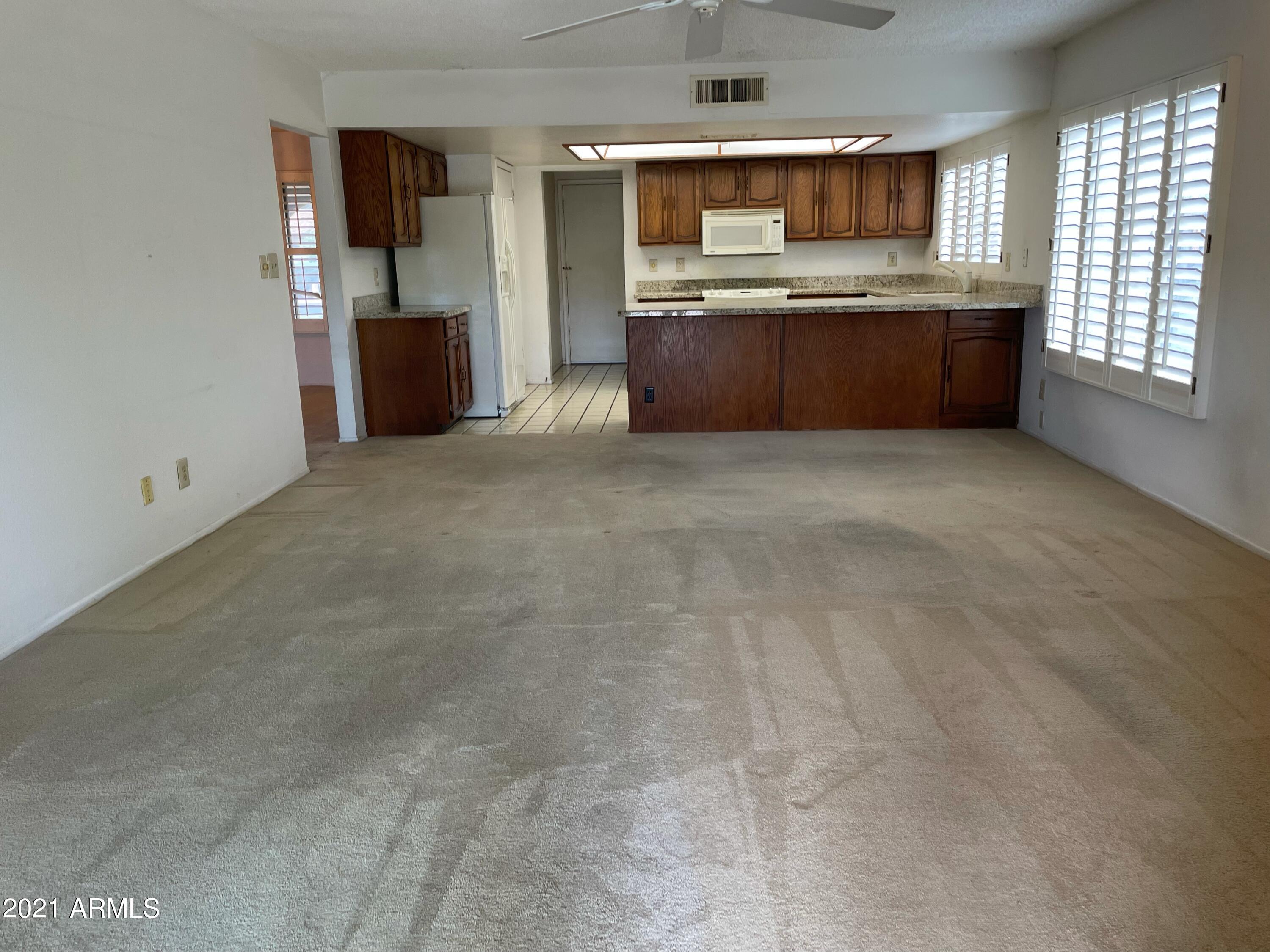 2461 West Hearn Road Phoenix, AZ 85023 - Photo 15 of 26 Family Room to Kitchen