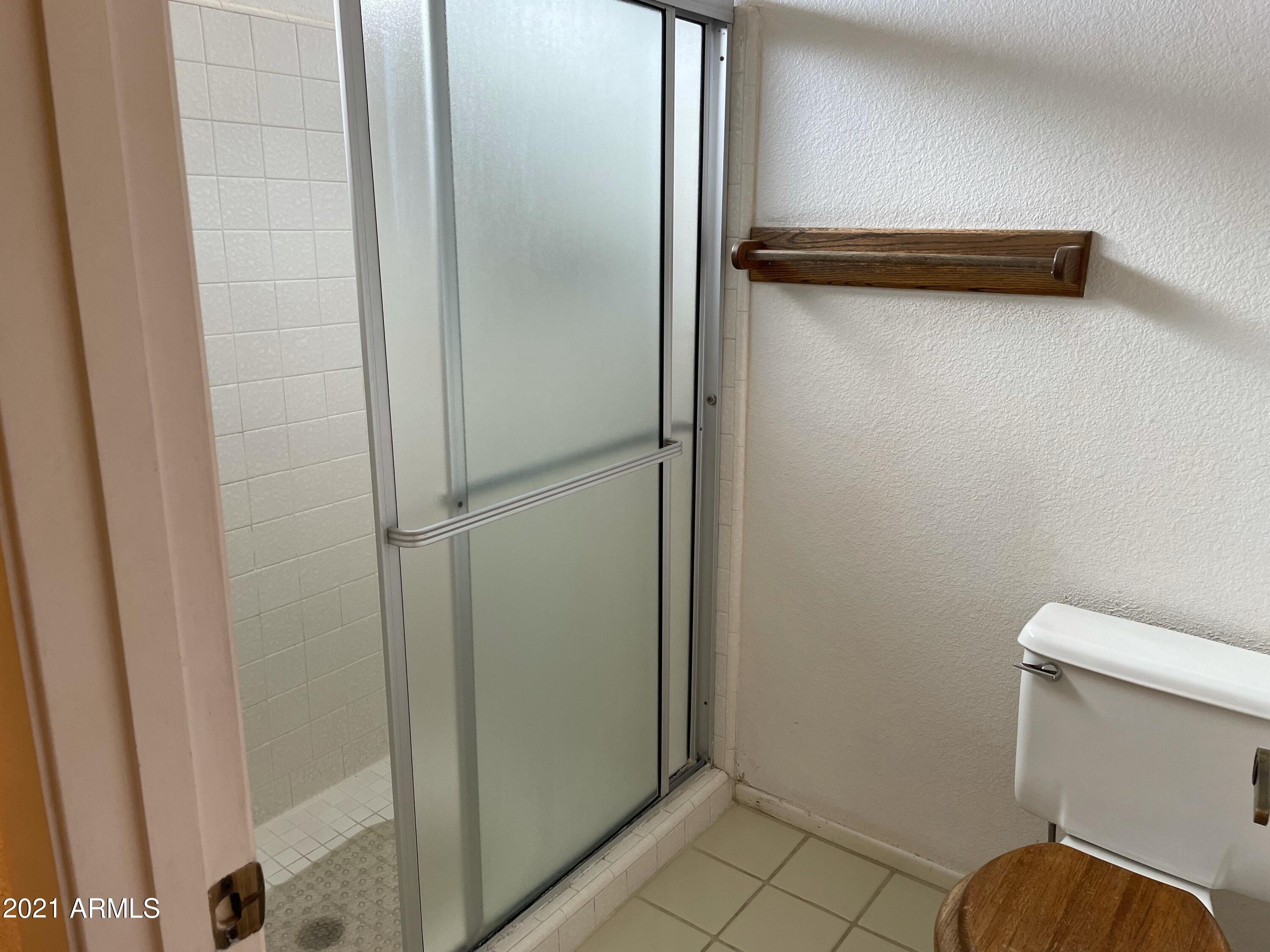 2461 West Hearn Road Phoenix, AZ 85023 - Photo 20 of 26 Master Shower, Toilet