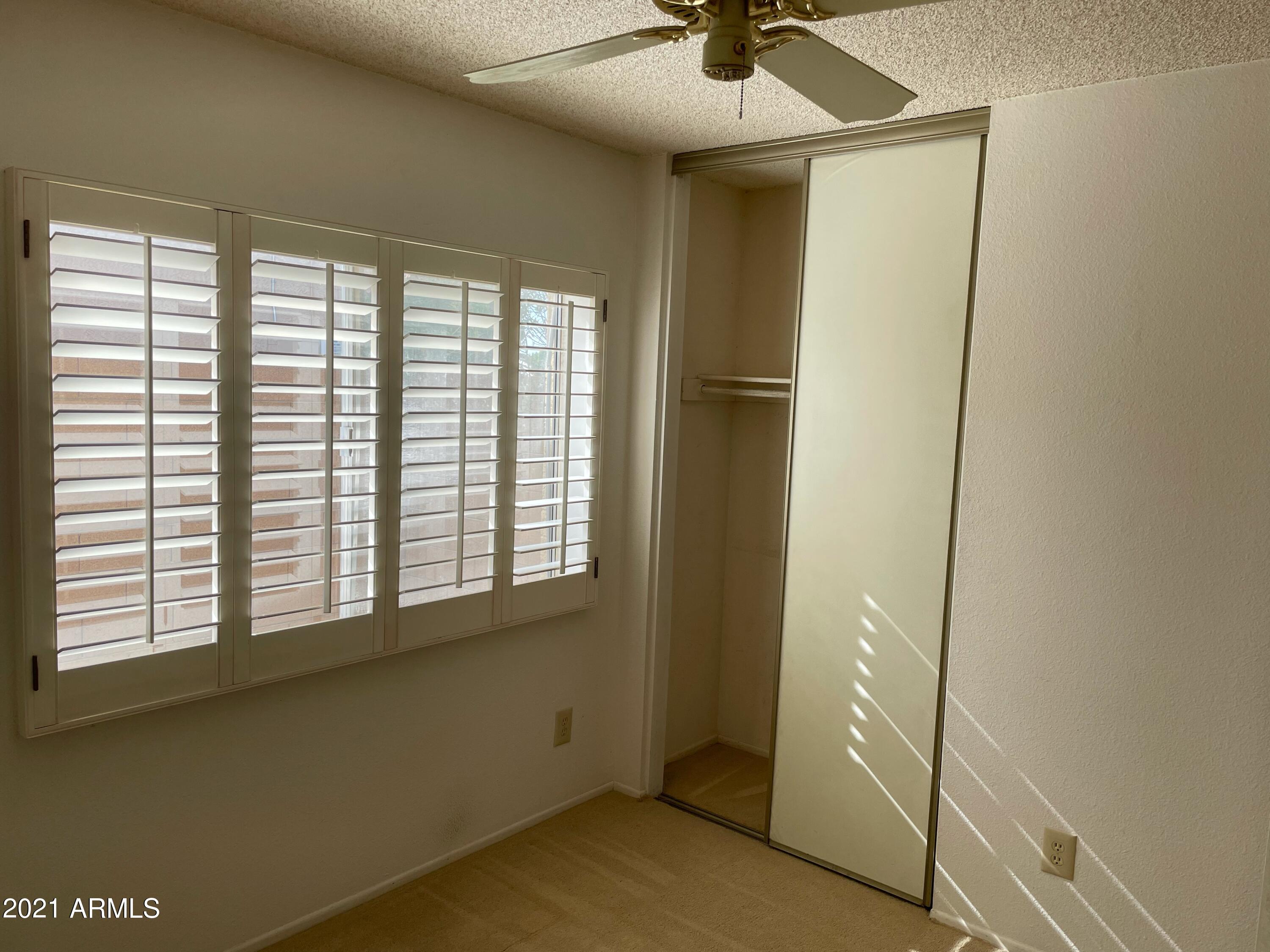2461 West Hearn Road Phoenix, AZ 85023 - Photo 6 of 26 Plantation Shutters Throughout