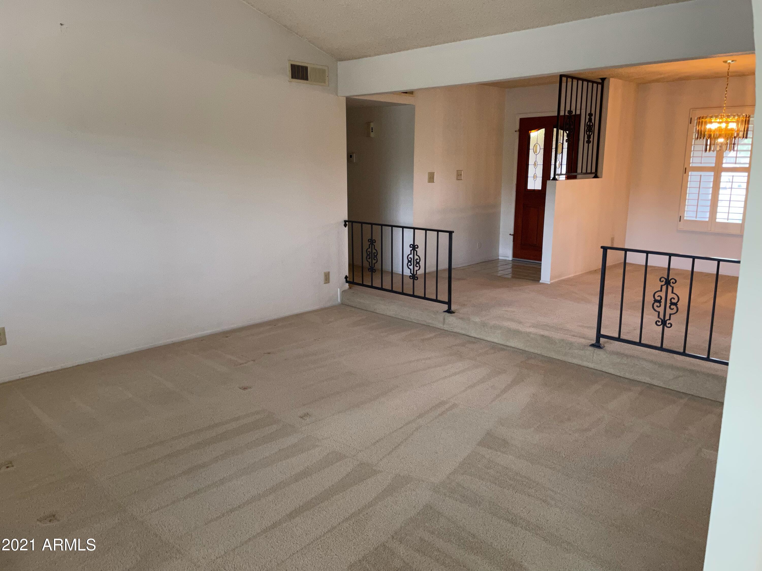 2461 West Hearn Road Phoenix, AZ 85023 - Photo 8 of 26 Living Room to Front Door