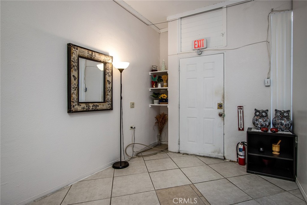 5929 Adobe Road Twentynine Palms, CA 92277 - Photo 4 of 33 a room with storage and utility