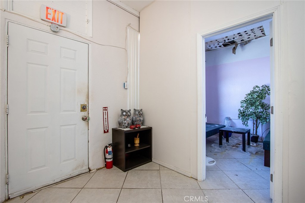 5929 Adobe Road Twentynine Palms, CA 92277 - Photo 5 of 33 a view of a hallway with seating area