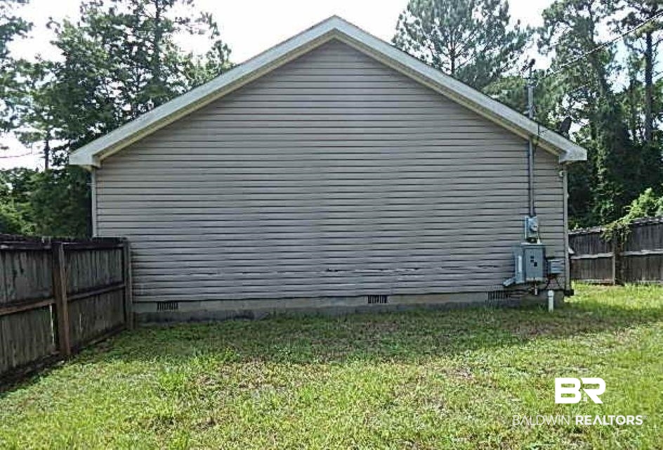 6996 Pinehill Road Daphne, AL 36526 - Photo 2 of 18 View of side of property with crawl space