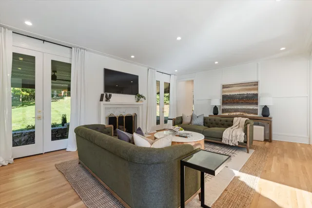 a hallway with a sink and a window