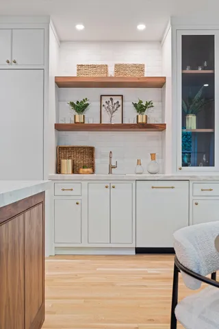 a bed room with furniture and a window